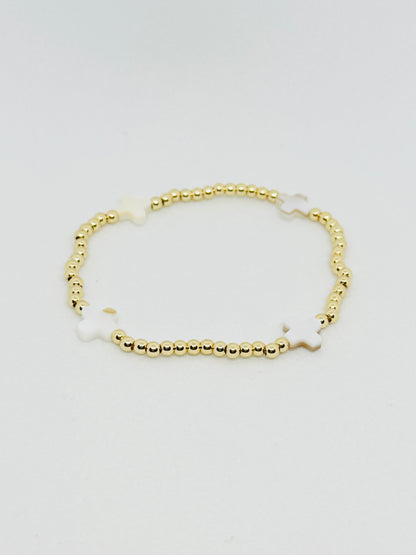 H L M Gold Beaded Cross Bracelet